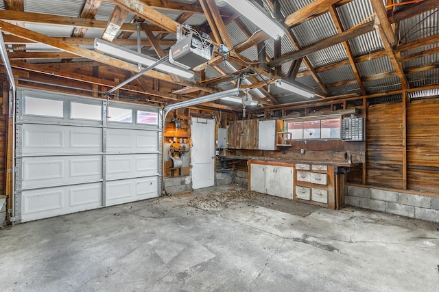 garage featuring a garage door opener