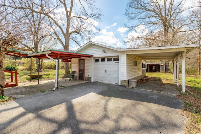 garage featuring driveway