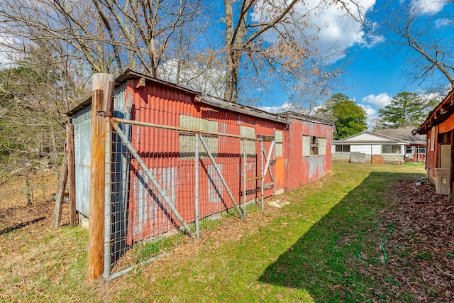 view of poultry coop with a yard