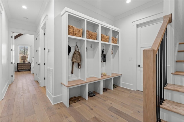 mudroom featuring recessed lighting, light wood finished floors, and ornamental molding