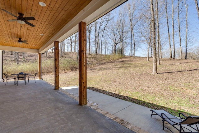 view of patio / terrace featuring outdoor dining space and a ceiling fan