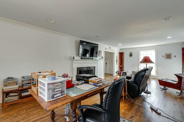 office with recessed lighting, a premium fireplace, wood-type flooring, and ornamental molding