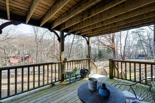 deck featuring outdoor dining area