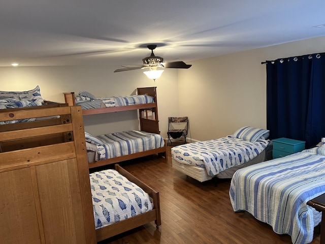 bedroom with wood finished floors and ceiling fan