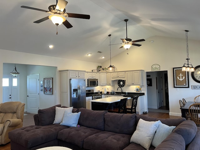 living area with high vaulted ceiling, dark wood-style floors, baseboards, and ceiling fan