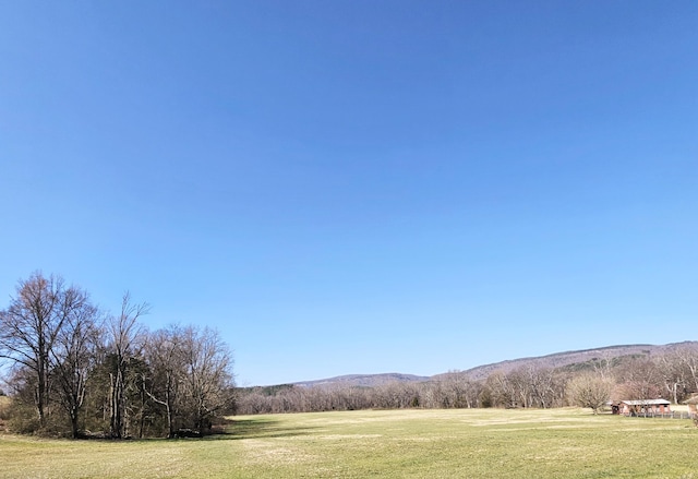 view of mountain feature featuring a rural view