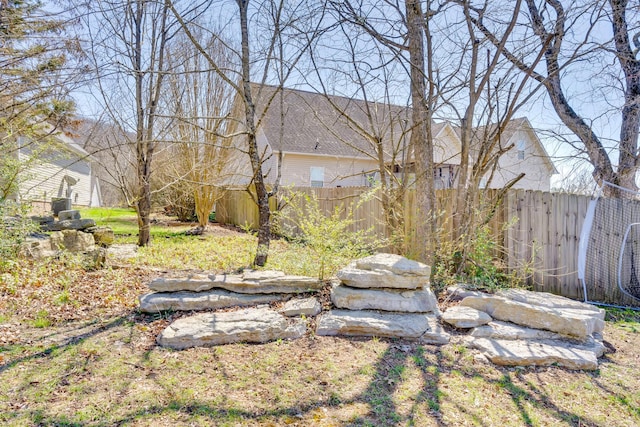 view of yard with fence