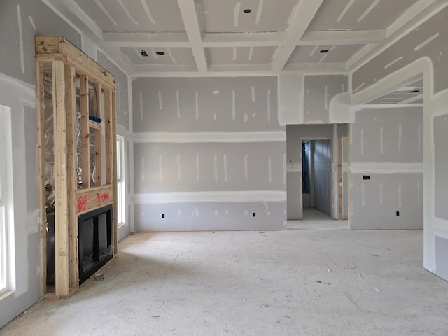 unfurnished living room with a wealth of natural light