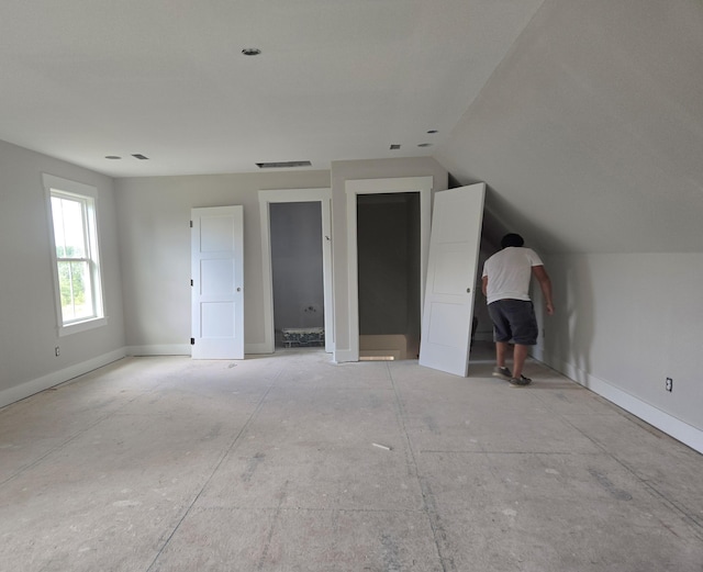 12800 Blakeslee Dr Unit 22, Soddy Daisy, TN 37379 - unfurnished bedroom with baseboards and vaulted ceiling