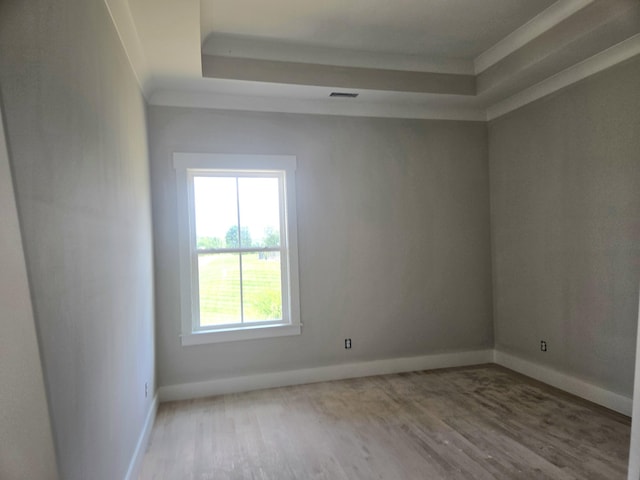12800 Blakeslee Dr Unit 22, Soddy Daisy, TN 37379 - spare room with wood finished floors and a raised ceiling
