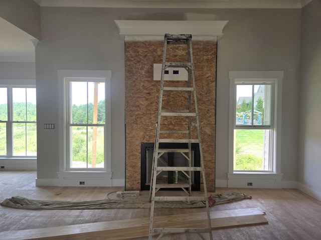 12800 Blakeslee Dr Unit 22, Soddy Daisy, TN 37379 - living area with wood finished floors, a fireplace, and plenty of natural light