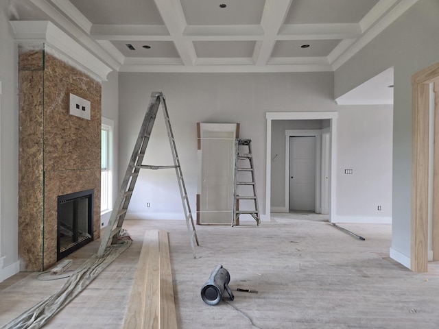 12800 Blakeslee Dr Unit 22, Soddy Daisy, TN 37379 - unfurnished living room featuring coffered ceiling, a large fireplace, beam ceiling, and a high ceiling