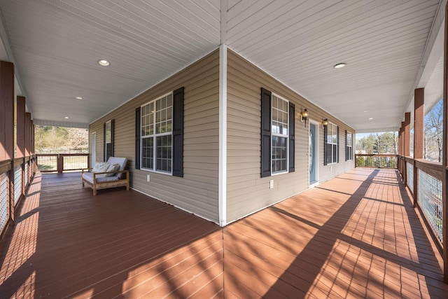 wooden terrace with a porch