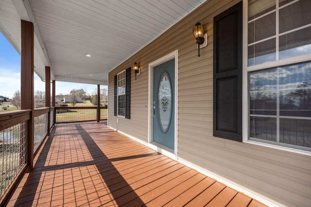 wooden deck featuring a porch