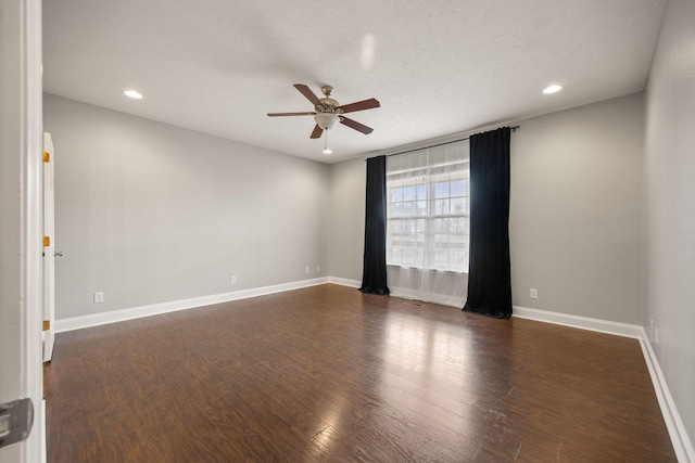 unfurnished room featuring dark wood-type flooring, recessed lighting, baseboards, and ceiling fan