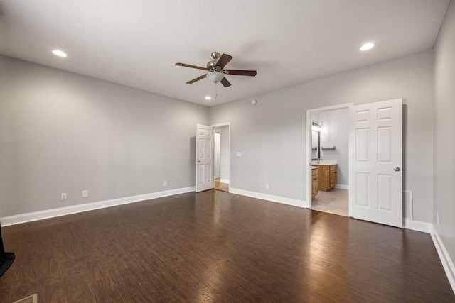 unfurnished bedroom featuring recessed lighting, baseboards, and wood finished floors