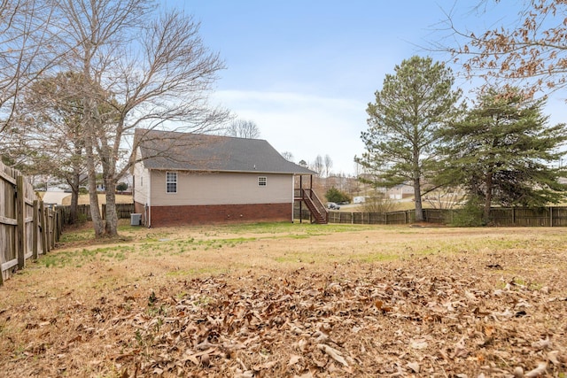 view of yard featuring a fenced backyard