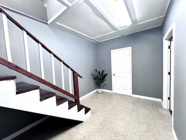 stairway with baseboards