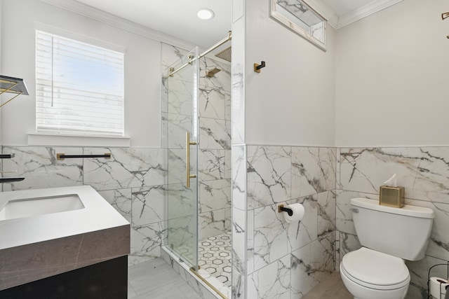 full bath featuring a marble finish shower, crown molding, toilet, wainscoting, and marble finish floor