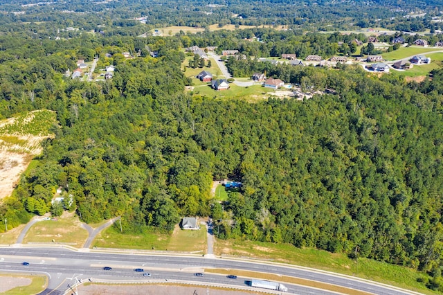 aerial view with a wooded view