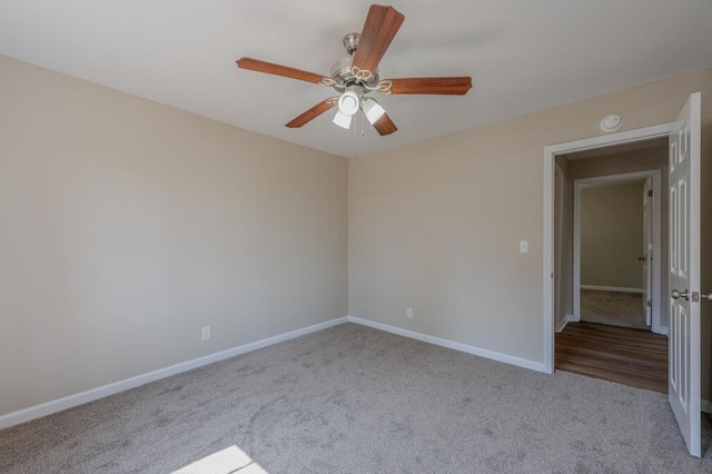 unfurnished bedroom with baseboards, carpet, and ceiling fan