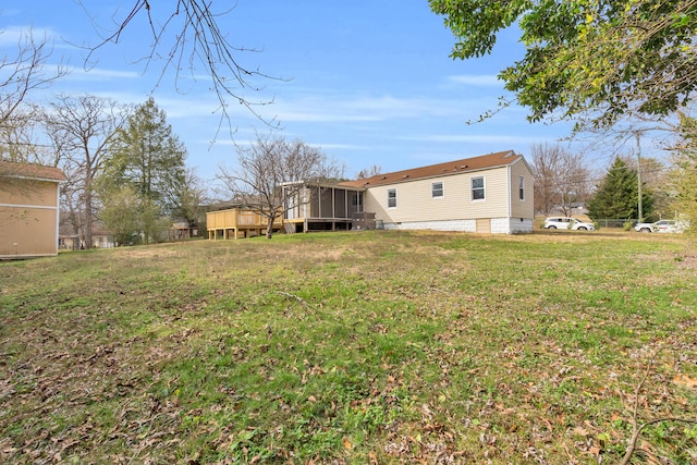 view of yard with a sunroom