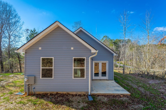 rear view of house with a patio and french doors