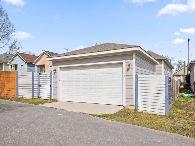 detached garage with fence