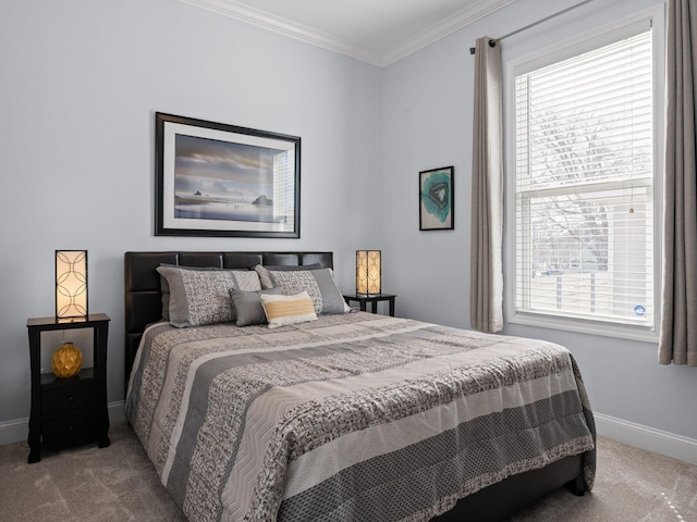 carpeted bedroom featuring multiple windows, crown molding, and baseboards