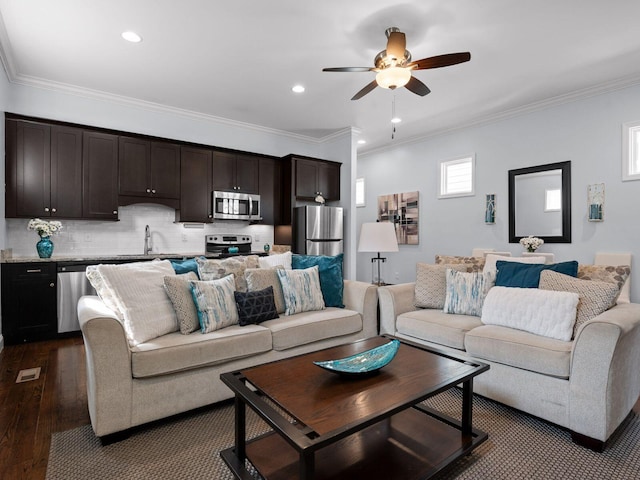 living room featuring dark wood-style floors, recessed lighting, ceiling fan, and ornamental molding