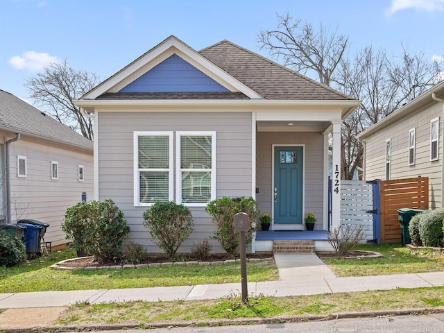 view of front of house with roof with shingles