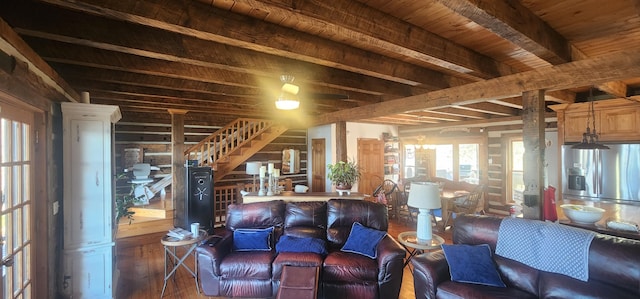 living room featuring beam ceiling, stairway, wooden ceiling, and wood-type flooring