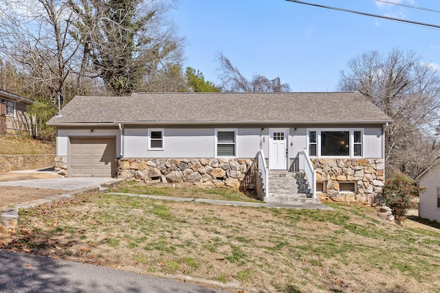 ranch-style home with stone siding, a front lawn, a garage, and a shingled roof