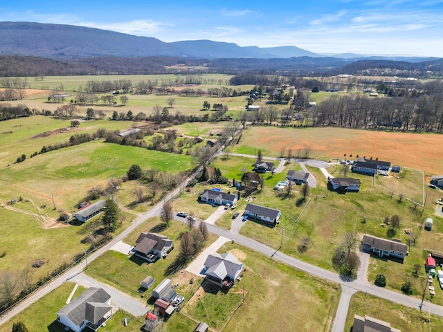 drone / aerial view with a rural view and a mountain view