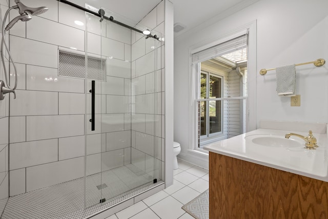 bathroom with tile patterned flooring, a stall shower, toilet, and vanity