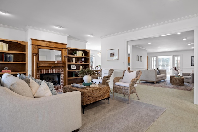 carpeted living area featuring recessed lighting, a fireplace, and ornamental molding