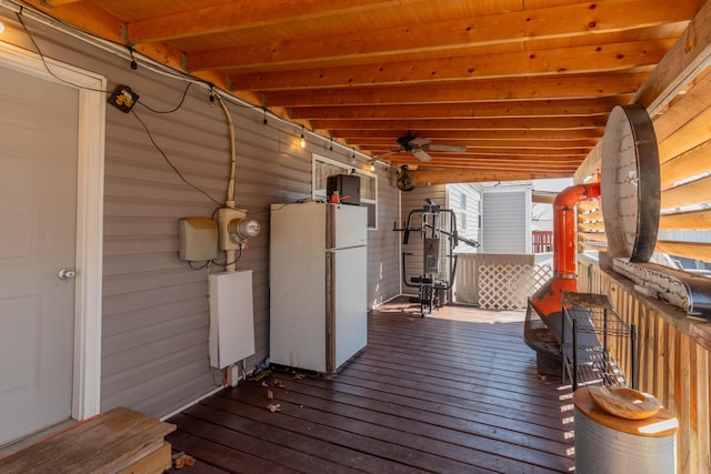 wooden deck with ceiling fan