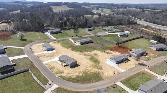 bird's eye view with a view of trees