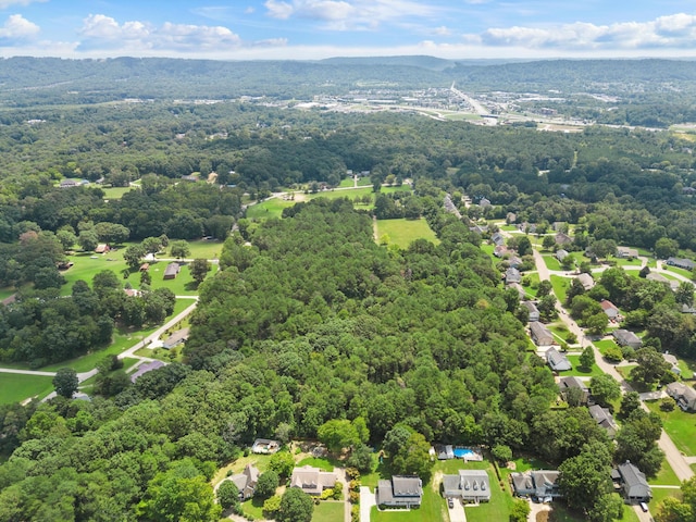 aerial view with a forest view and a residential view