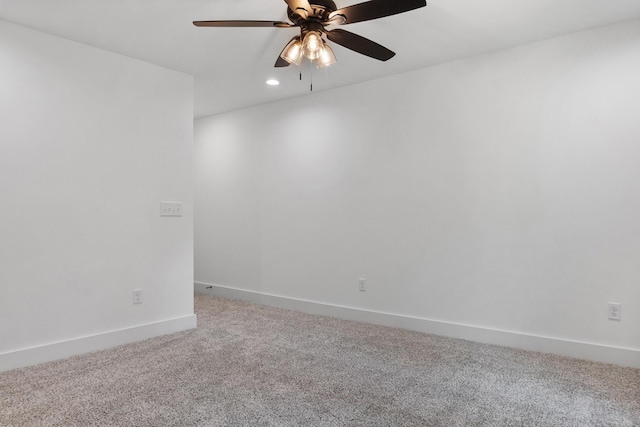 carpeted empty room with recessed lighting, baseboards, and a ceiling fan