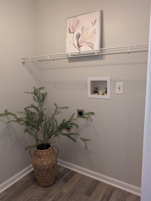 clothes washing area featuring washer hookup, wood finished floors, baseboards, hookup for an electric dryer, and laundry area