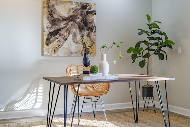 office featuring wood finished floors and baseboards