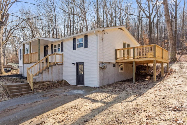 view of property exterior featuring covered porch