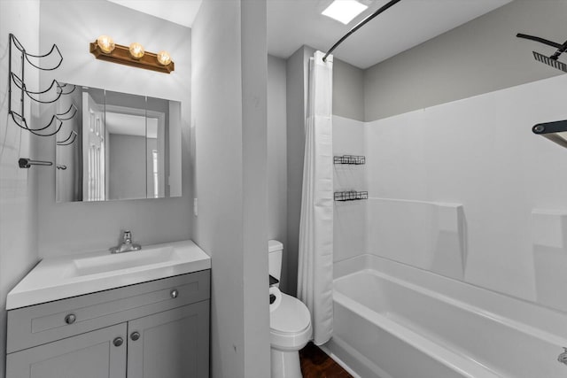 full bathroom with shower / bathtub combination with curtain, toilet, and vanity