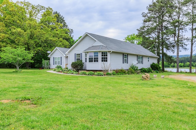 single story home with a shingled roof, a front yard, dirt driveway, and crawl space