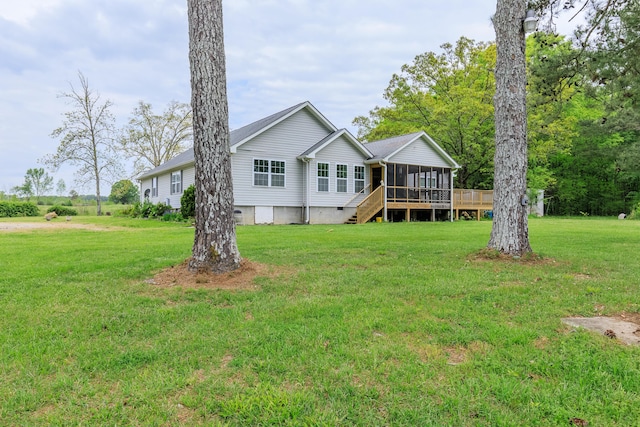 ranch-style home featuring crawl space, a front yard, and a sunroom