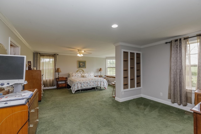 carpeted bedroom featuring crown molding, multiple windows, baseboards, and ceiling fan