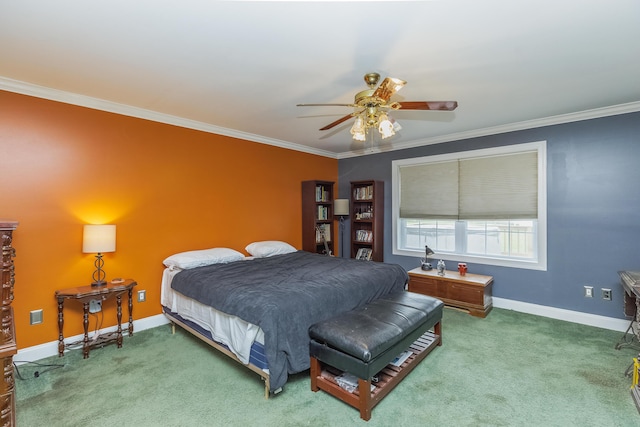 carpeted bedroom with ceiling fan, baseboards, and ornamental molding