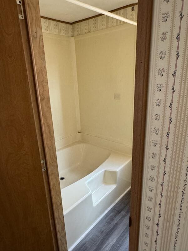 full bath featuring wood finished floors