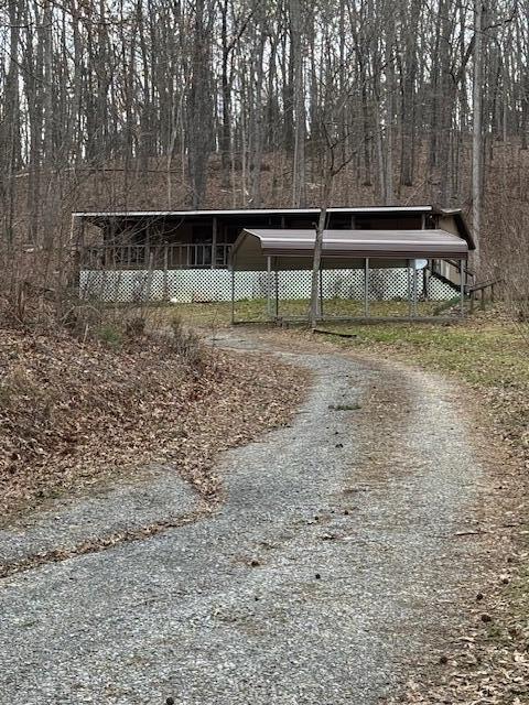 exterior space featuring gravel driveway